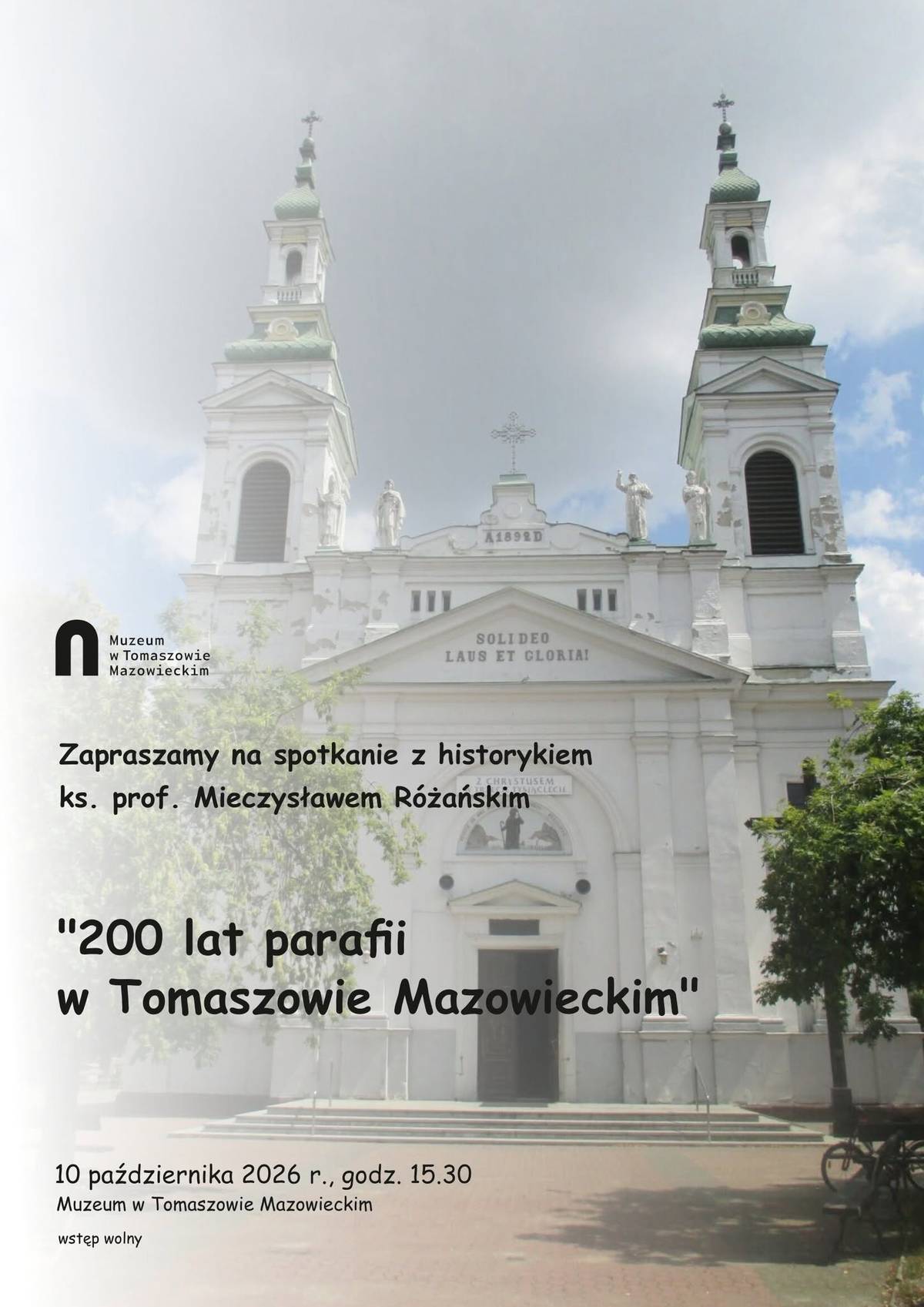 Na zdjęciu plakat zapowiadający spotkanie z ks. prof. Mieczysławem Różańskim pt. 200 lat parafii w Tomaszowie Mazowieckim. Na plakacie front sanktuarium pw. św. Antoniego w Tomaszowie Mazowieckim